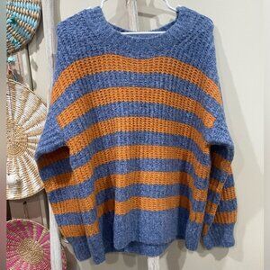 Cozy casual oversize sweater. Pull over style size is S/M.